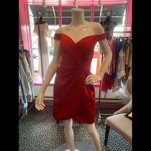 Red pleated tulip hem cocktail dress